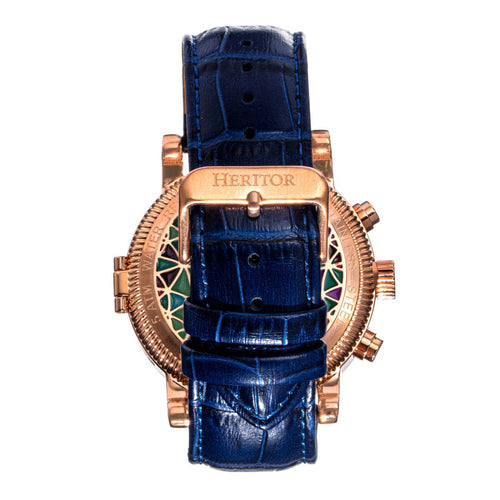 Blue watch with rose gold case and strap on a white background
