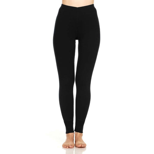 A person wearing dark navy blue full-length leggings, shown from the waist down against a plain white background.