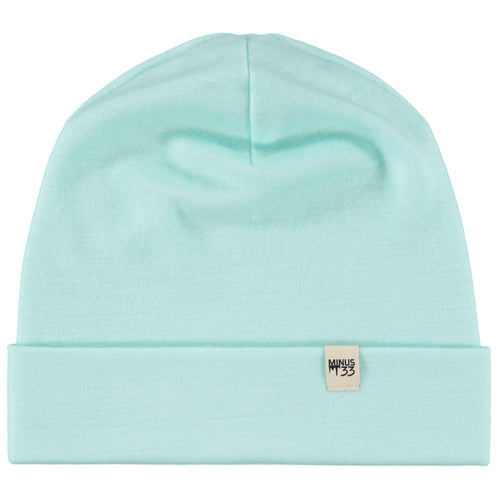 Light blue beanie with a brand label on a white background