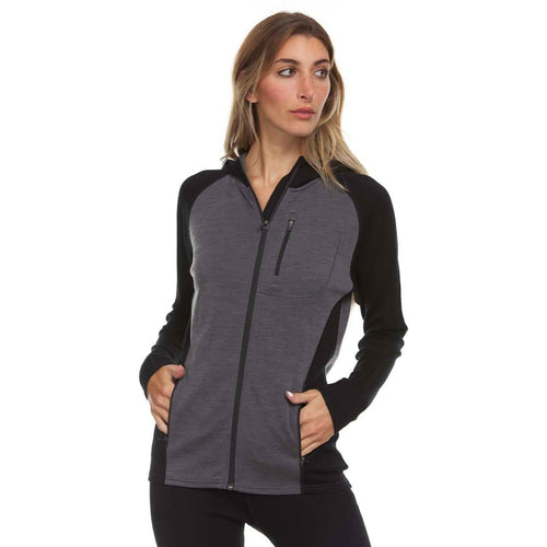 A woman modeling a long-sleeve athletic zip-up jacket with a heather gray body and black sleeves, collar, and side panels, against a plain white background.