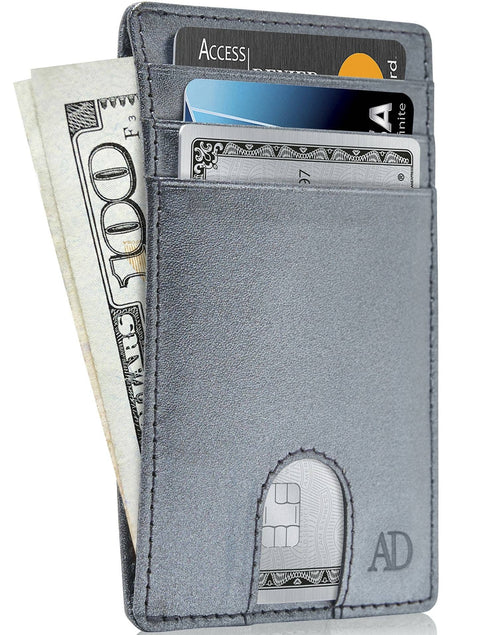 Gray wallet with money and cards on a white background