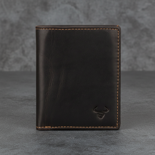A dark brown leather bifold wallet with light tan contrast stitching and an embossed bull logo in the bottom right corner, set against a textured gray background.