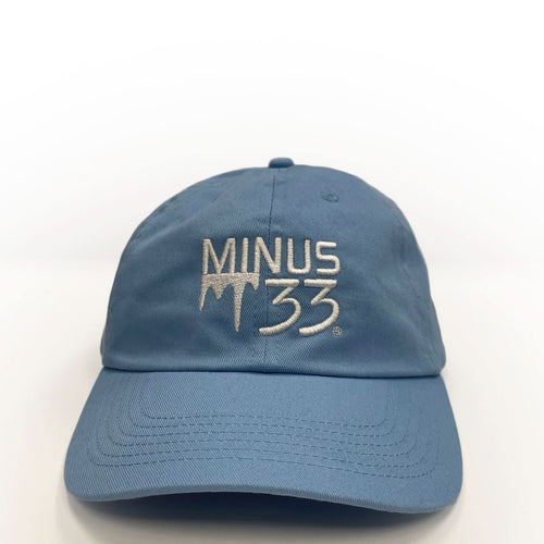 Blue cap with 'MINUS 33' logo on a white background