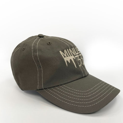 Dark green baseball cap with 'Minus33' logo on a white background
