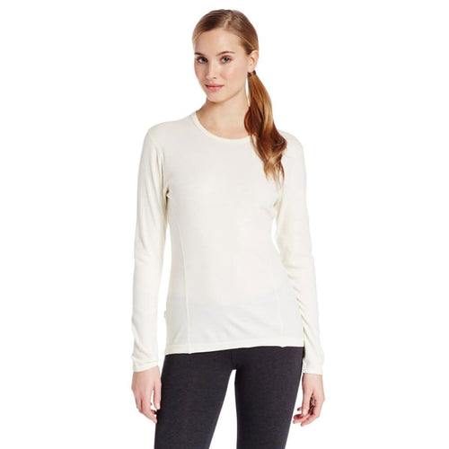 Woman wearing a white long-sleeve shirt on a white background