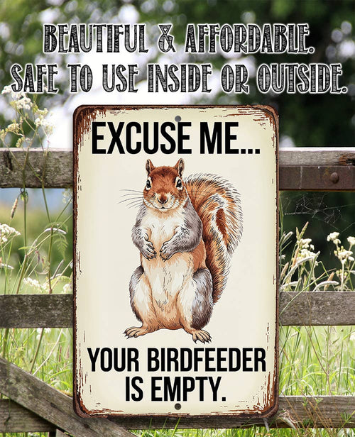Sign with a squirrel illustration and text about a birdfeeder on a wooden fence background.