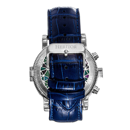 Blue watch with silver case and detailed face on a white background