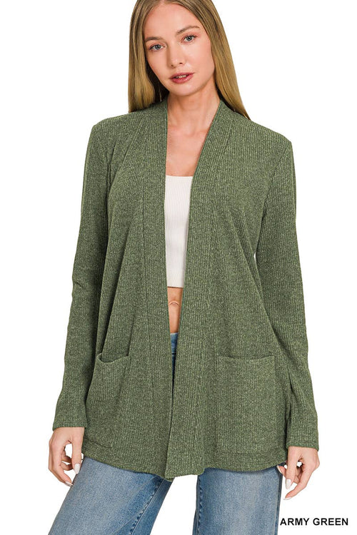 A woman modeling an open-front, long-sleeve cardigan in heathered army green, worn over a white crop top and blue jeans against a plain white background.