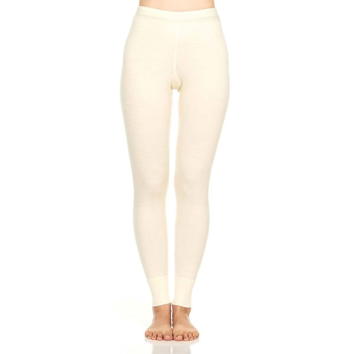 Beige leggings worn by a person on a white background