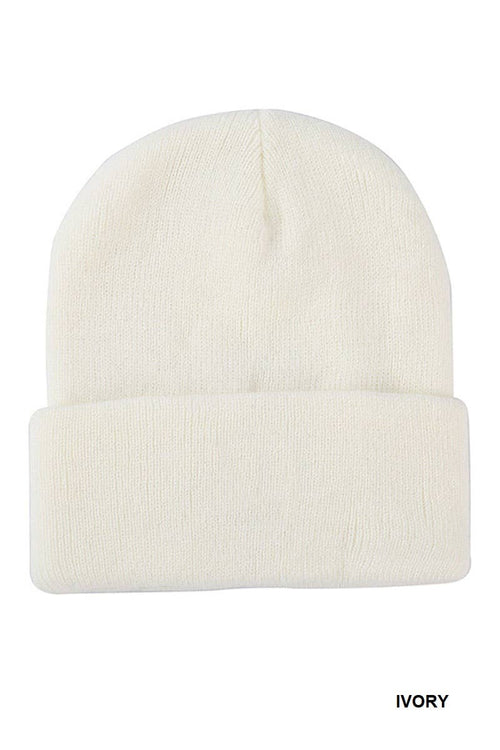 An ivory knit beanie hat with a folded cuff, shown against a plain white background with the word 'IVORY' printed in the bottom right corner.