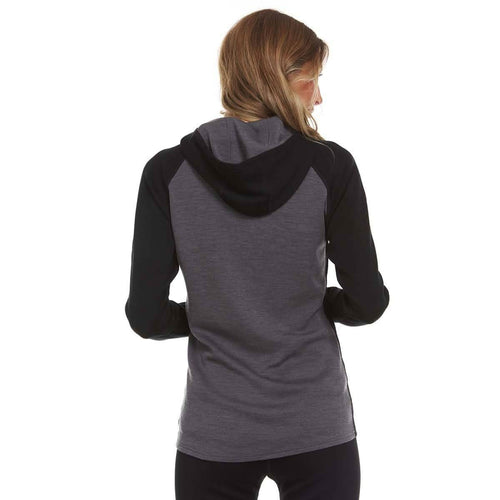 Person wearing a gray and black hoodie on a white background