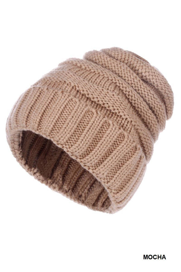 A textured knit beanie hat in a warm taupe or mocha brown color, shown on a plain white background with a 'MOCHA' text label in the bottom right corner.