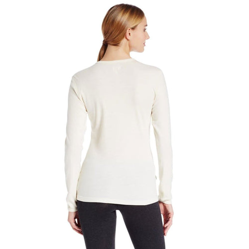 Woman wearing a white long-sleeve shirt on a white background