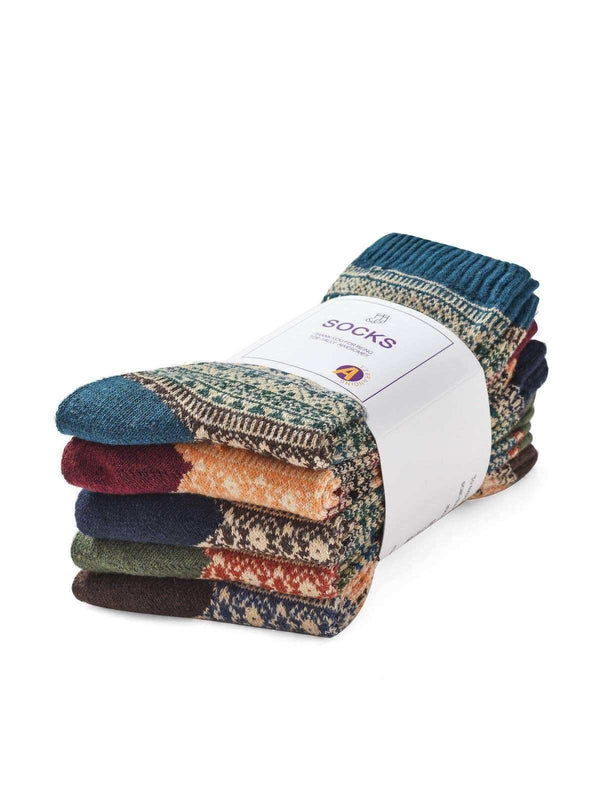 Cozy patterned socks in earthy tones, bundled with a gift label, perfect for warm comfort.