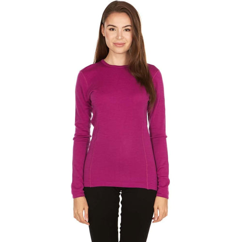 Woman wearing a bright pink long-sleeve top on a white background