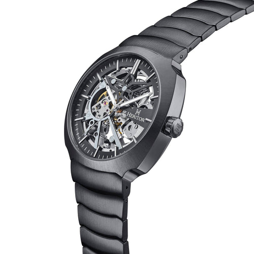 Black mechanical watch with a visible brand name on a white background