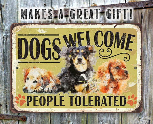 Decorative sign with dogs and text 'DOGS WEELCOME PEOPLE TOLERATED' on a rustic background