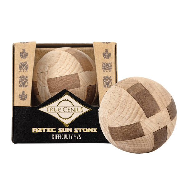 Wooden puzzle ball with patchwork design in front of its packaging, featuring 'True Genius' branding.