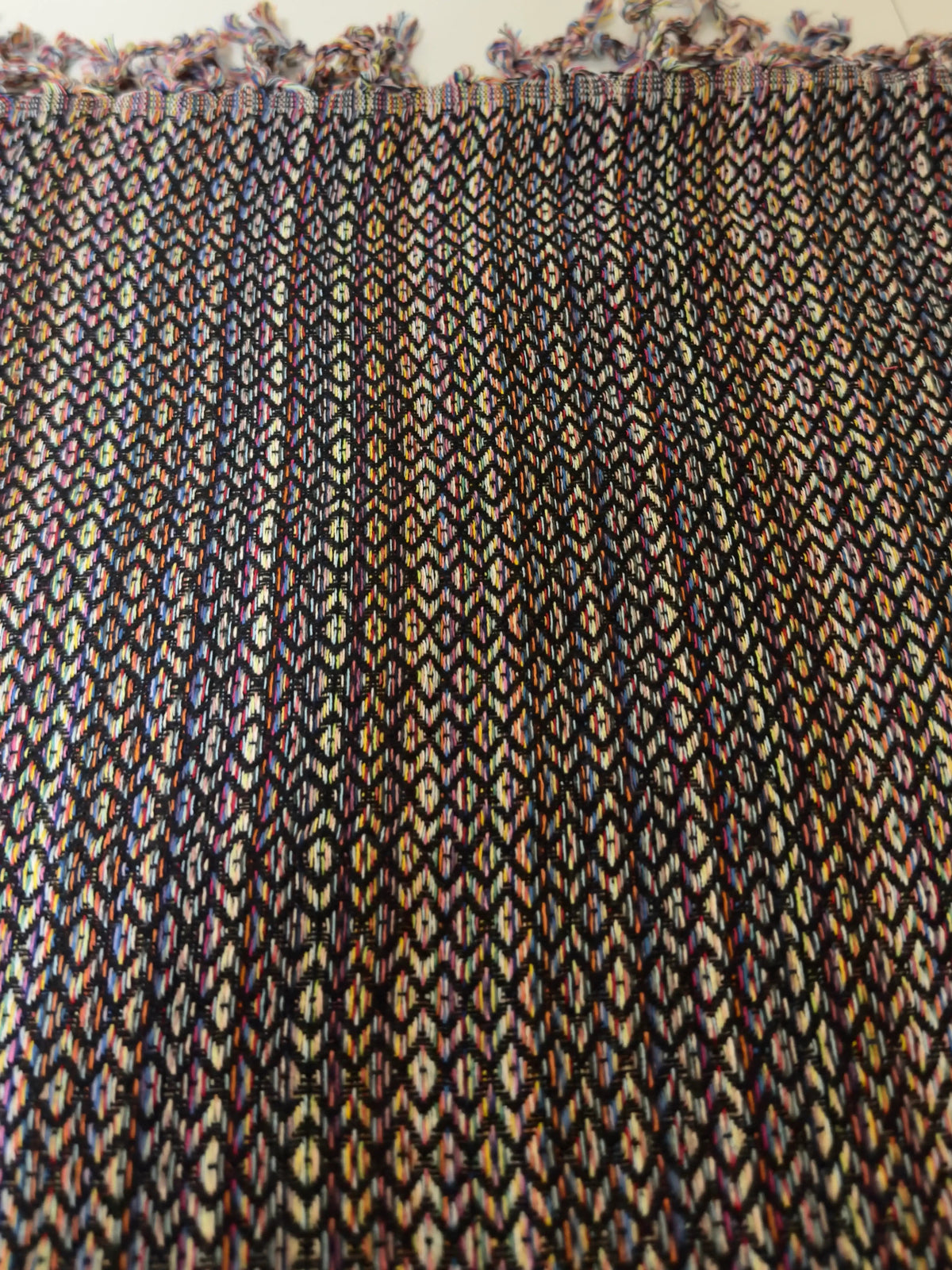 Textured fabric with a patterned design