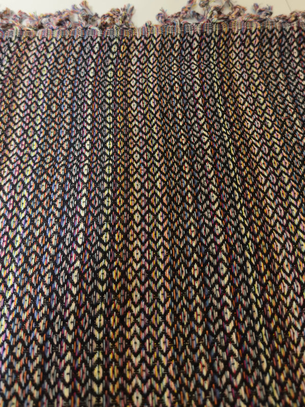 Textured fabric with a patterned design