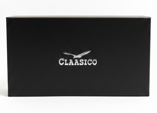 A black rectangular product box with a silver eagle logo and the word 'CLAASICO' printed on the front, set against a plain white background.