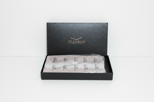 An open black CLASSICO gift box set against a plain white background.