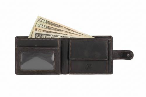 A dark brown leather bi-fold wallet shown open, containing US twenty dollar bills, with a clear ID window on the left and an RFID pocket on the right, set against a plain white background.