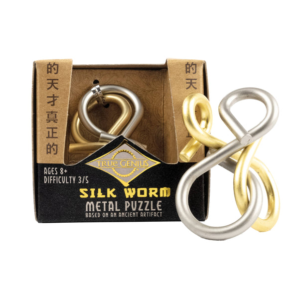 Silk Worm metal puzzle with gold and silver links in front of its packaging box.