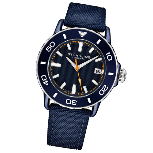 A Stuhrling Original analog watch with a dark blue fabric strap, a dark blue bezel, and a black textured dial with white and orange details, shown on a solid white background.