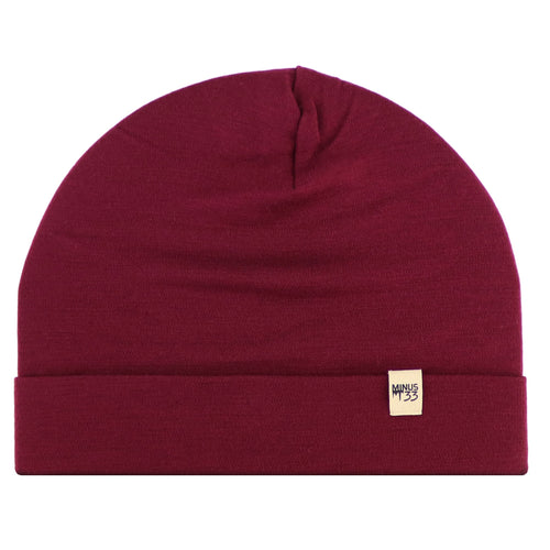 Maroon beanie with a gold tag on a white background