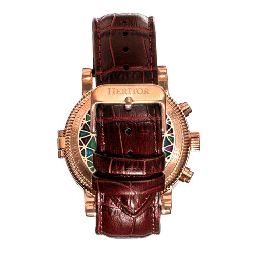 Luxury watch with brown leather strap and rose gold case on white background
