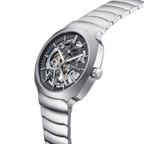 Silver watch with a detailed mechanism on a white background