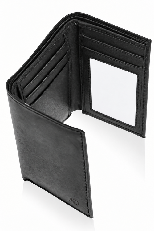 A black leather bi-fold wallet shown open, displaying its interior card slots, ID window, and smooth texture on a clean white background.