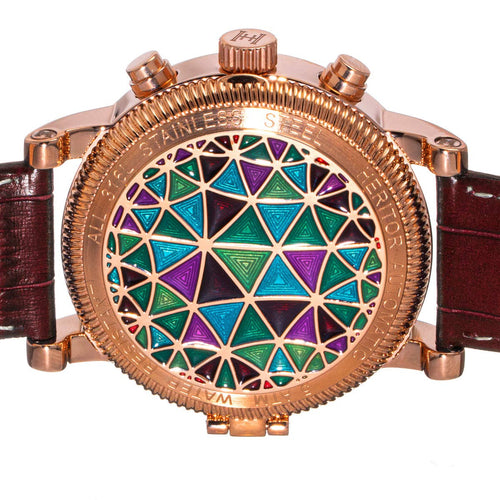 Watch with a geometric patterned face on a white background
