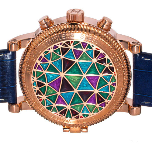 Watch with a geometric patterned face and blue strap on a white background