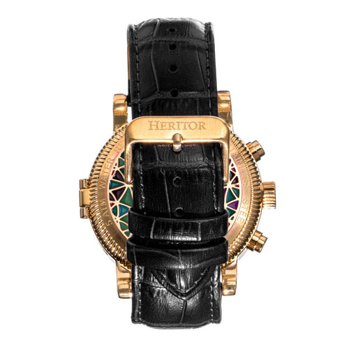 Luxury watch with gold case and black leather strap on a white background