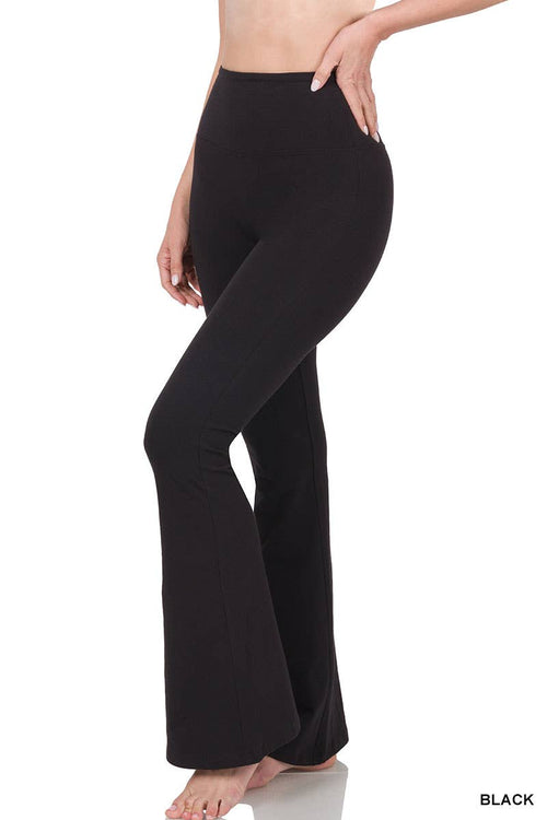 Black wide-leg pants worn by a person on a white background
