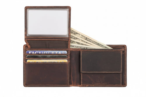 Brown leather wallet with various cards and money on a white background