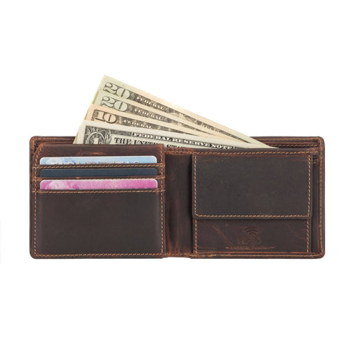 Brown leather wallet with money and cards on a white background